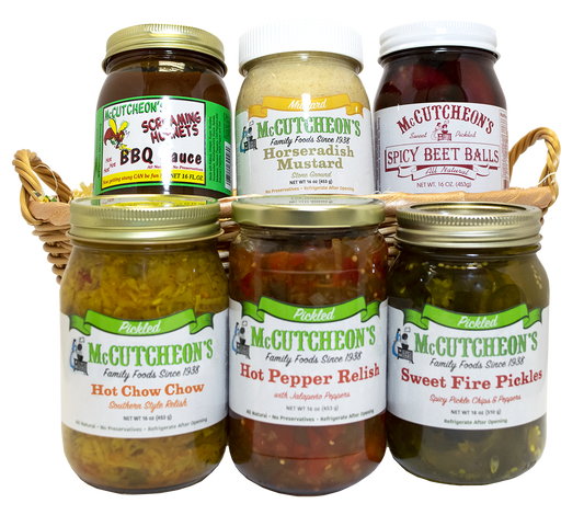 basket of Sweet Fire Pickles, Screaming Hornets Barbeque Sauce, Hot Pepper Relish, Horseradish Mustard, Spicy Beet Balls, and Hot Chow Chow